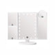 White trifold LED vanity mirror with lighted panels for makeup and beauty routine